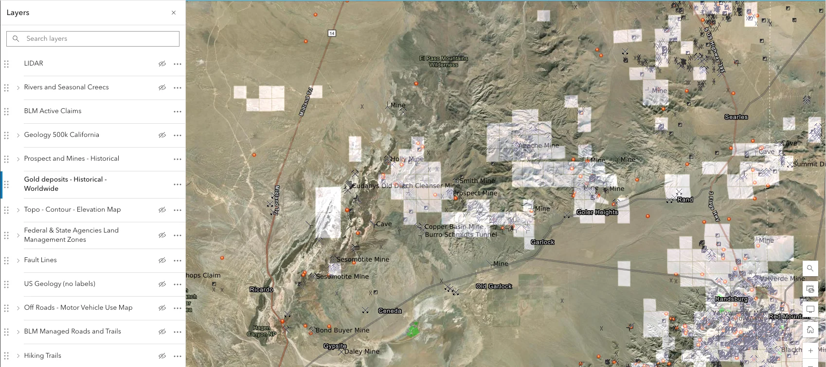 Interactive layers panel with geology, claims, and mine locations